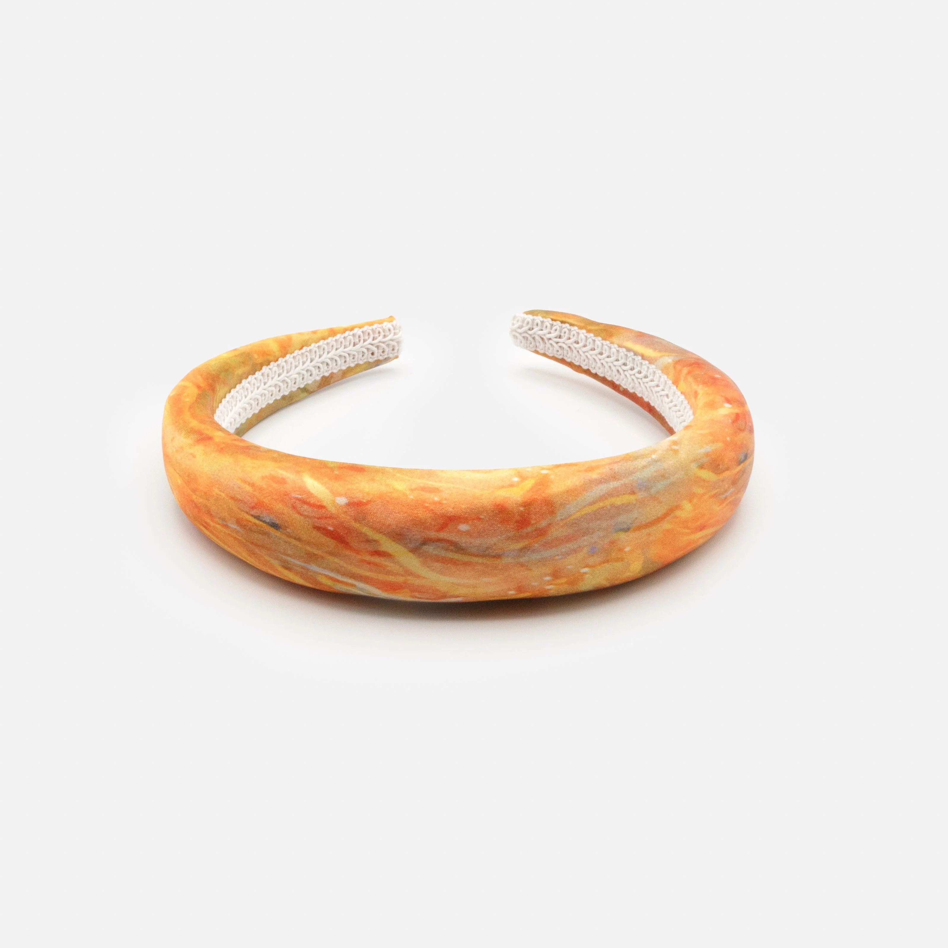 Bandeau rembourré aux tons orangés