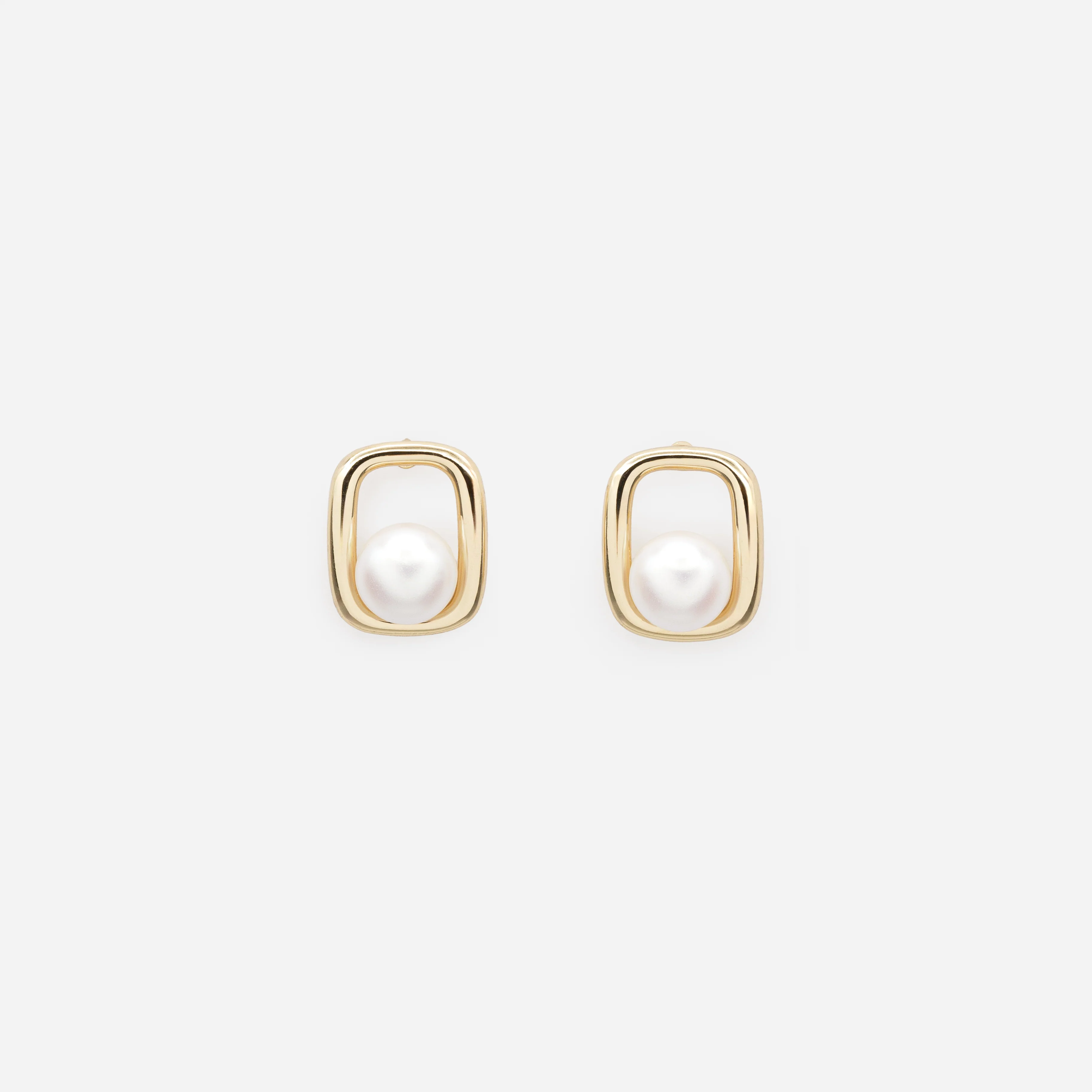 Boucles d'oreilles perle dans son cadre doré