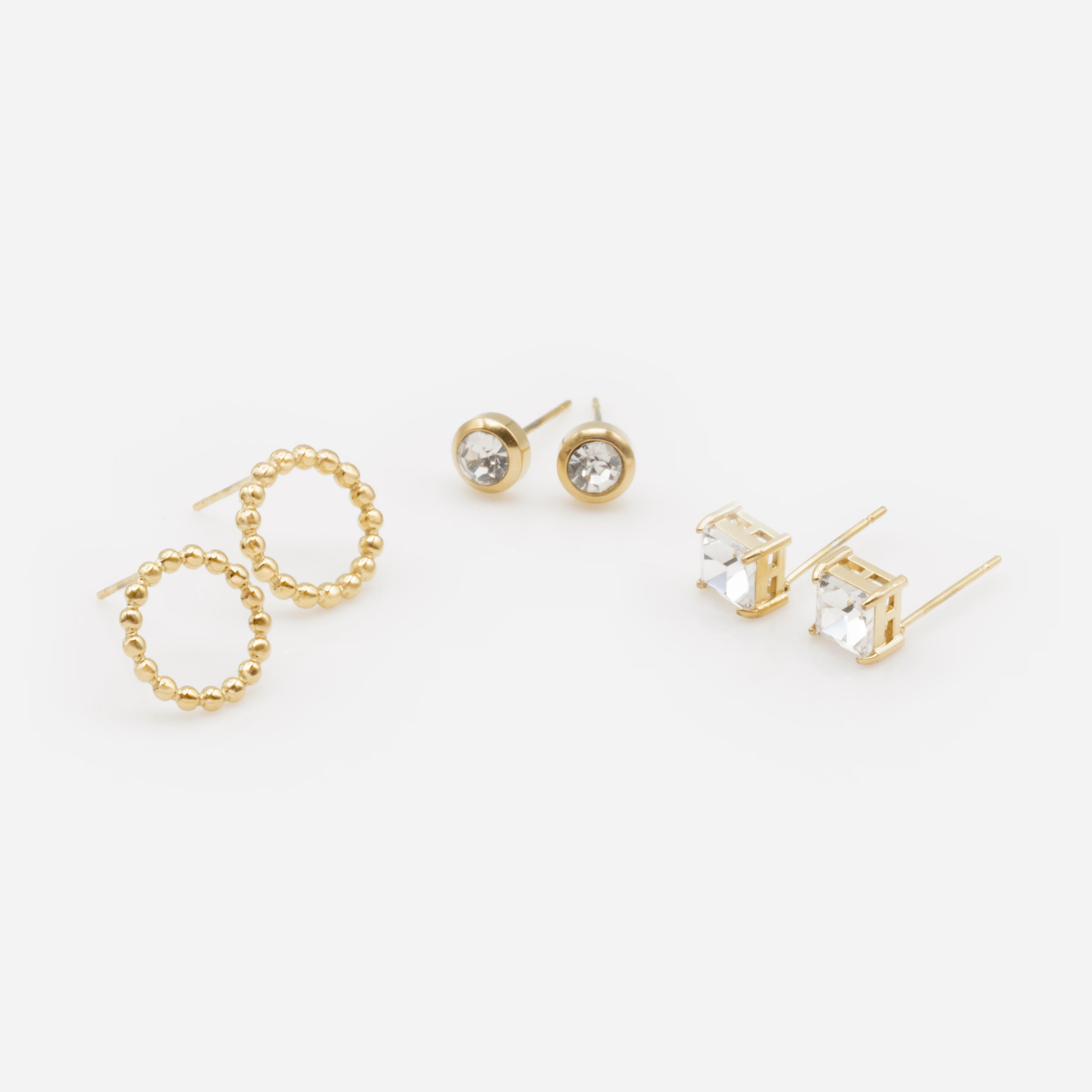 Trio de boucles d'oreilles dorées avec zircons cubiques en acier inoxydable - Image 2