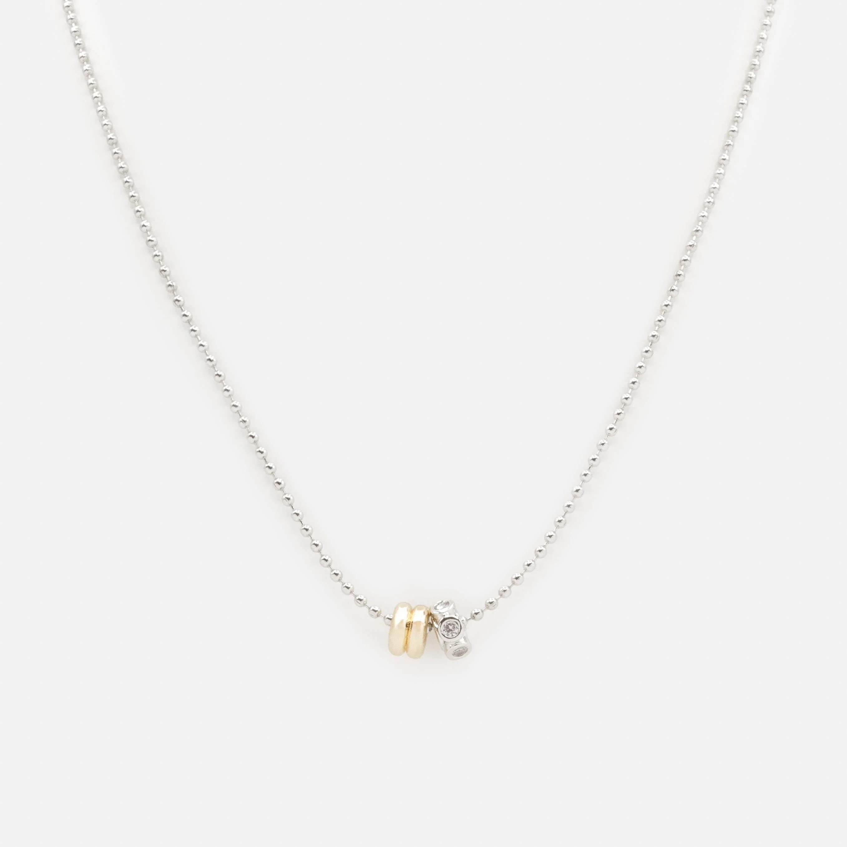 Collier argenté breloques cylindriques deux tons