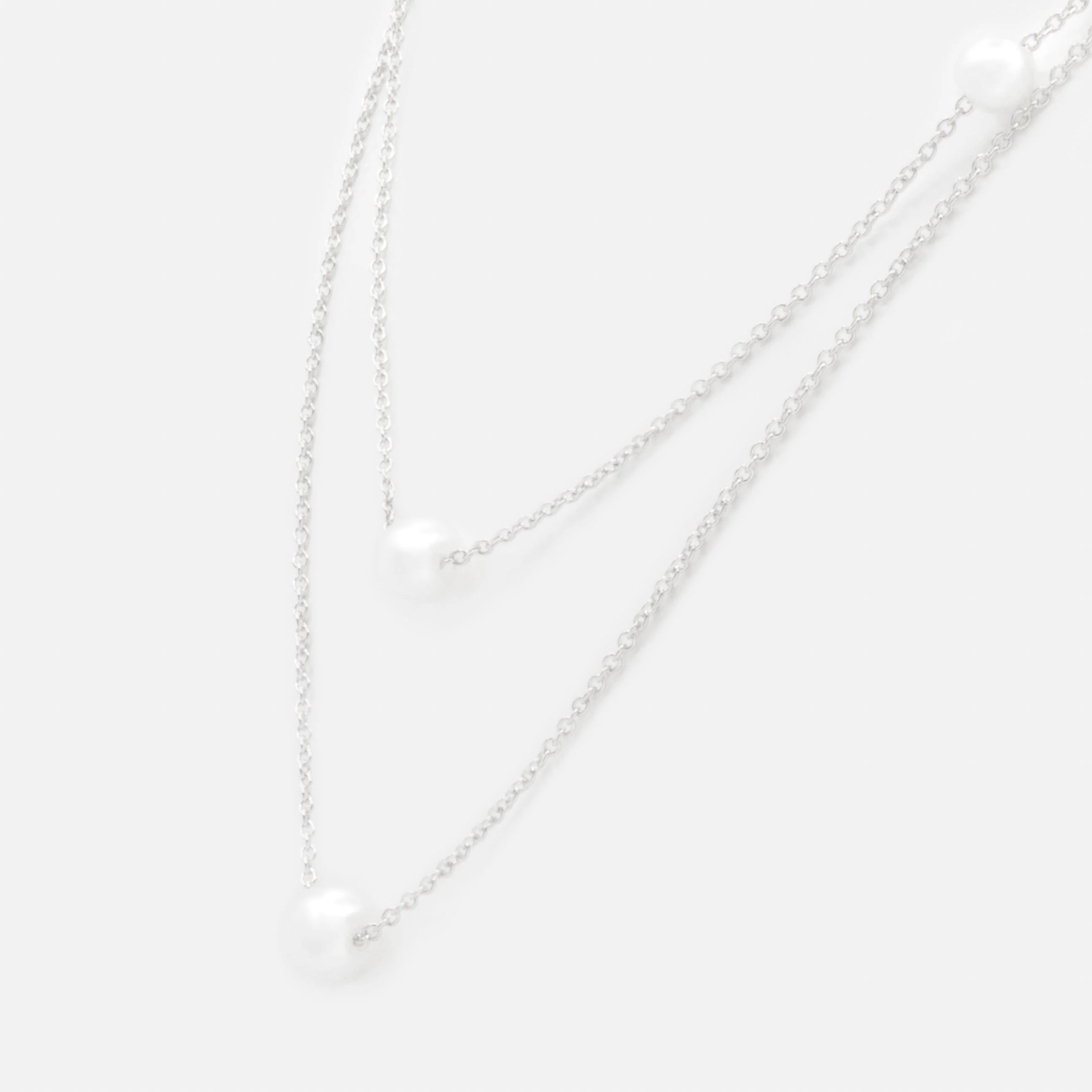 Collier argenté double chaîne avec perles rondes - Image 2