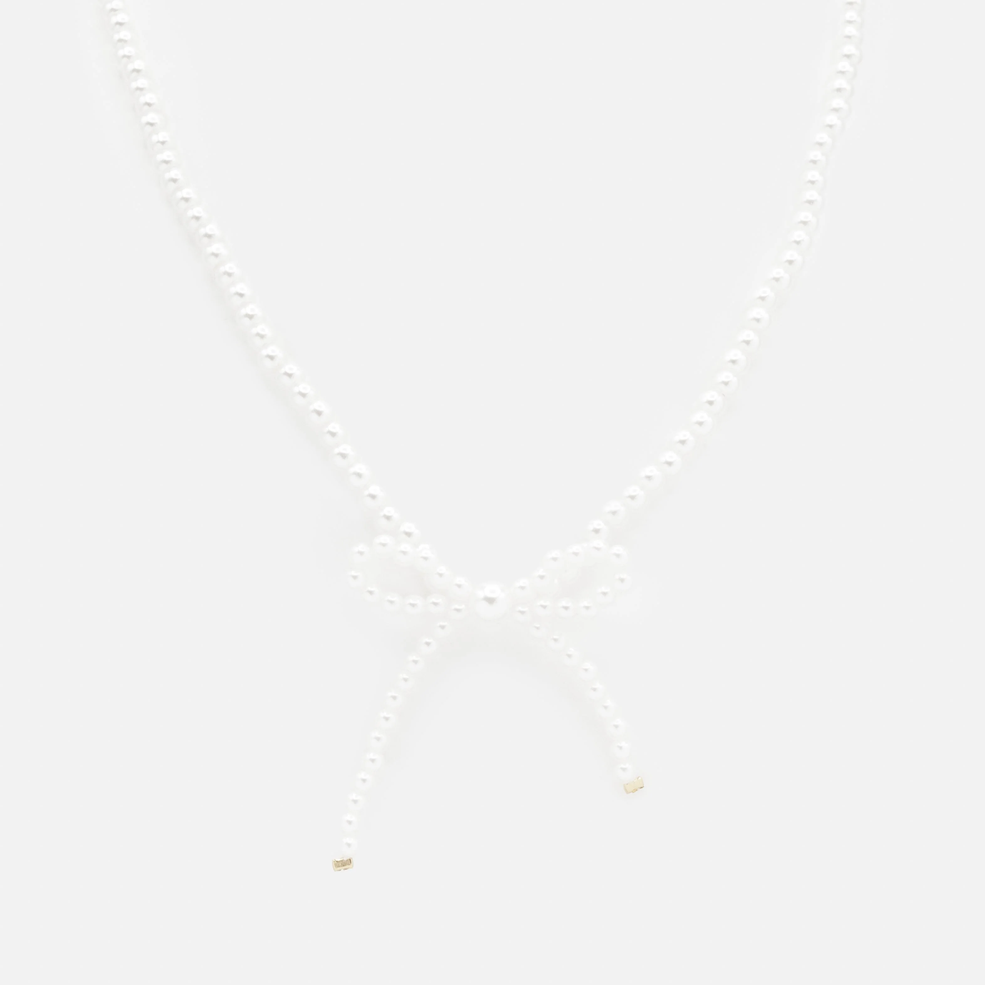 Collier de perles avec boucle latérale