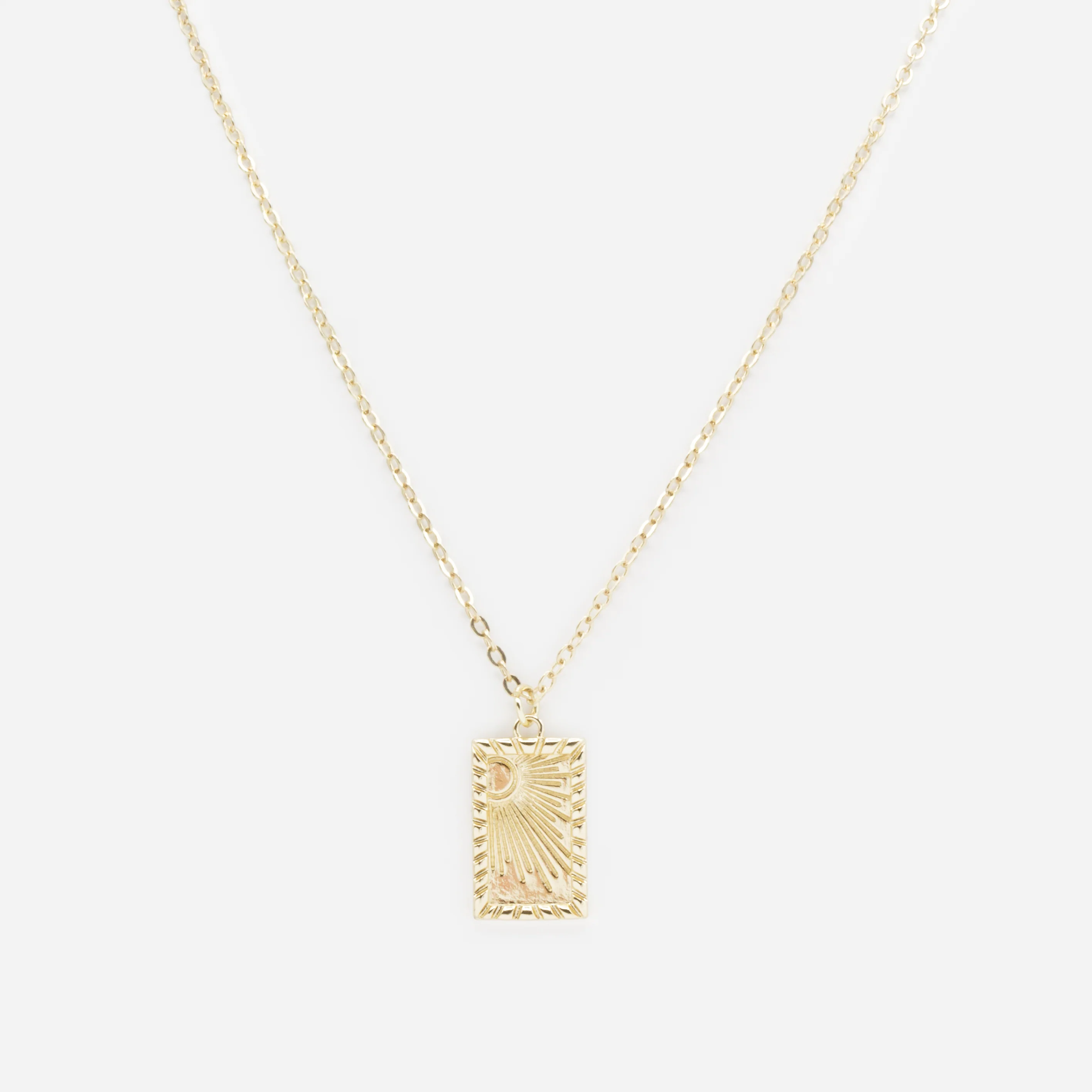 Collier doré avec breloque texturée soleil levant