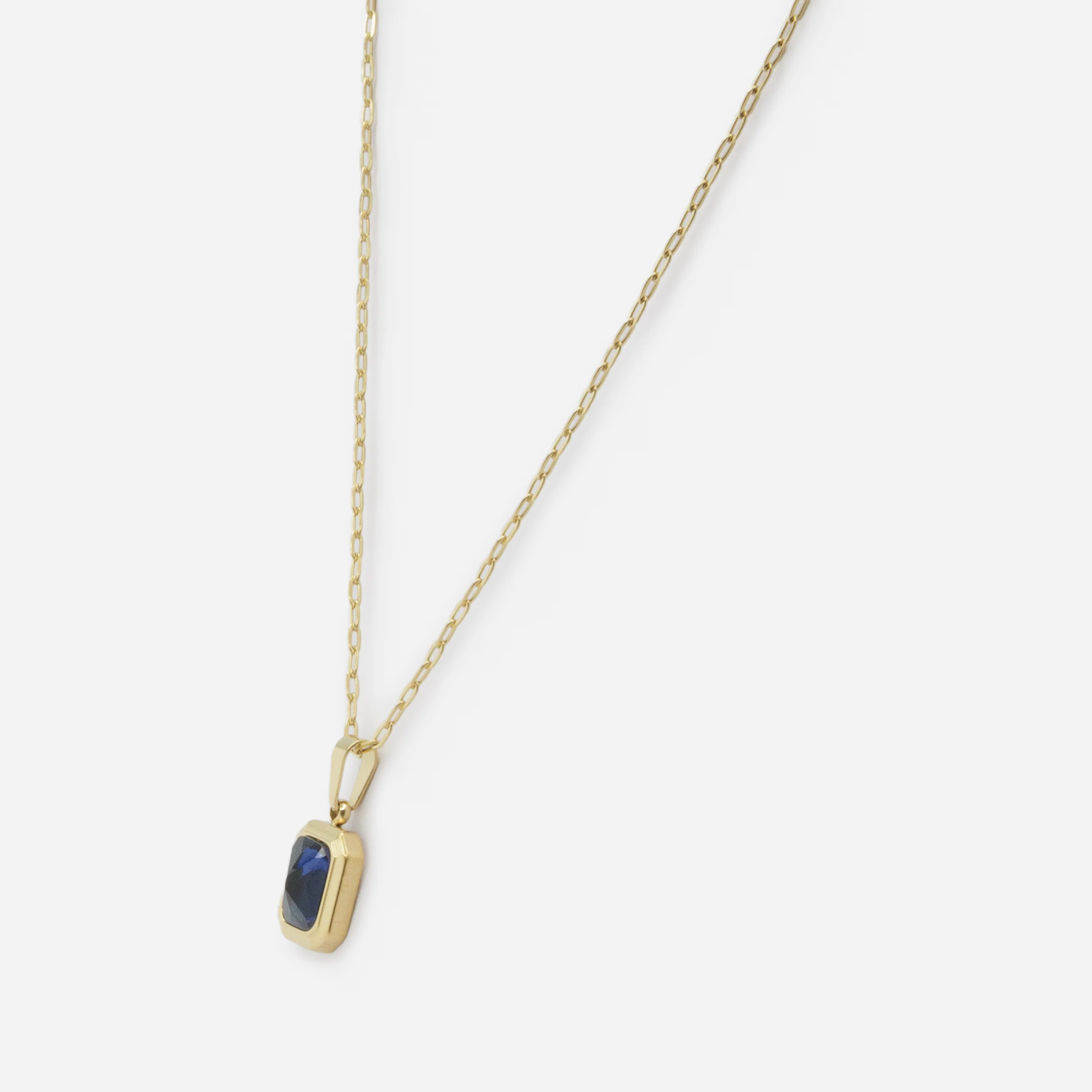 Collier doré avec petite pierre rectangulaire bleue - Image 2