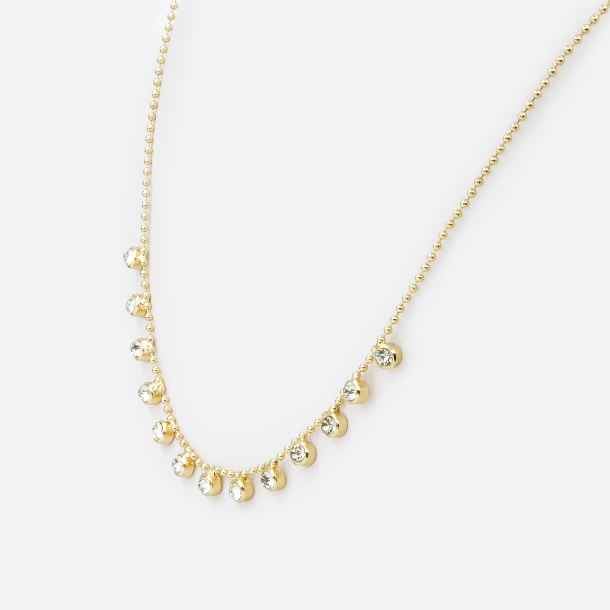 Collier de fines billes dorées avec breloques de zircons cubiques - Image 2