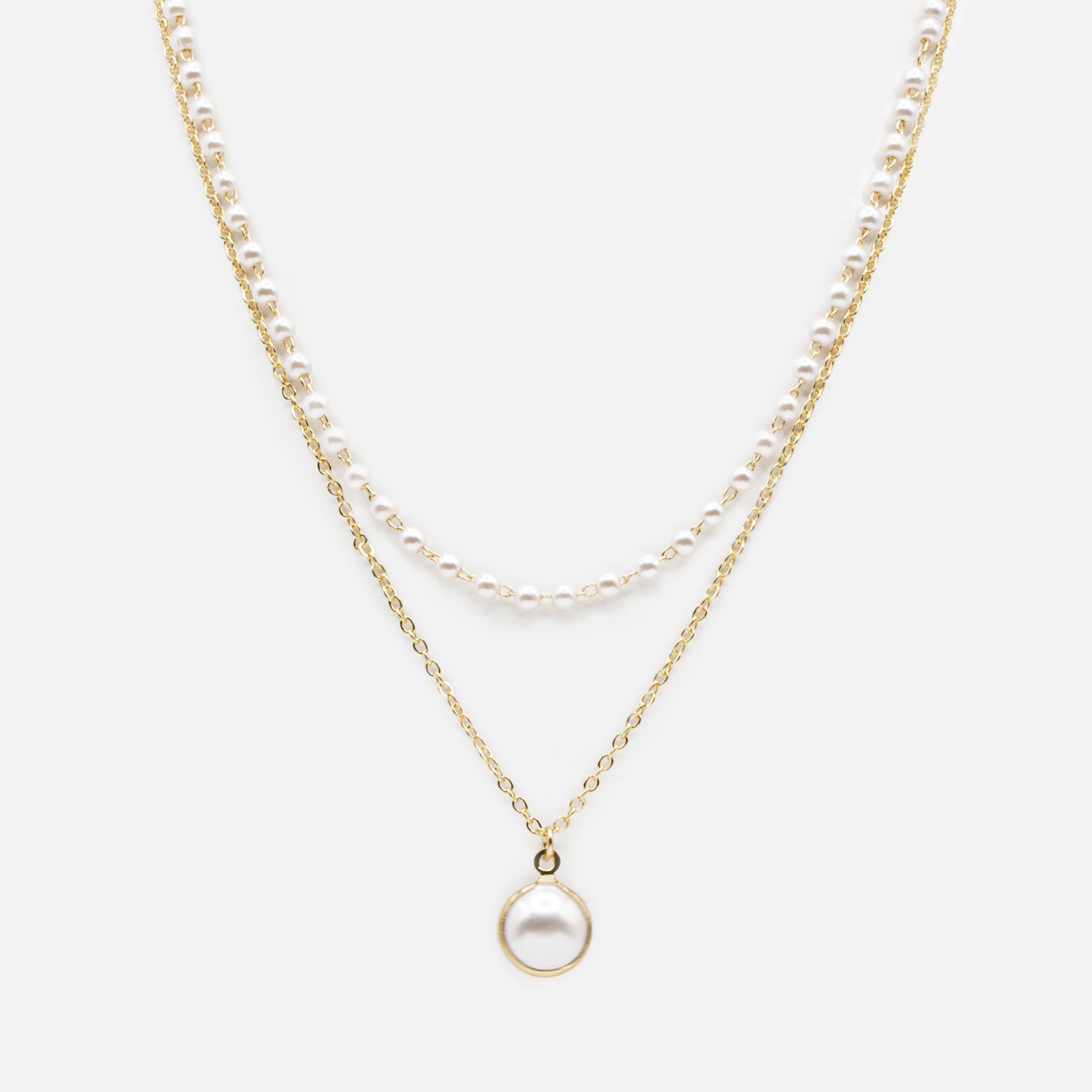 Collier double chaîne pendentif perle synthétique dans son anneau doré