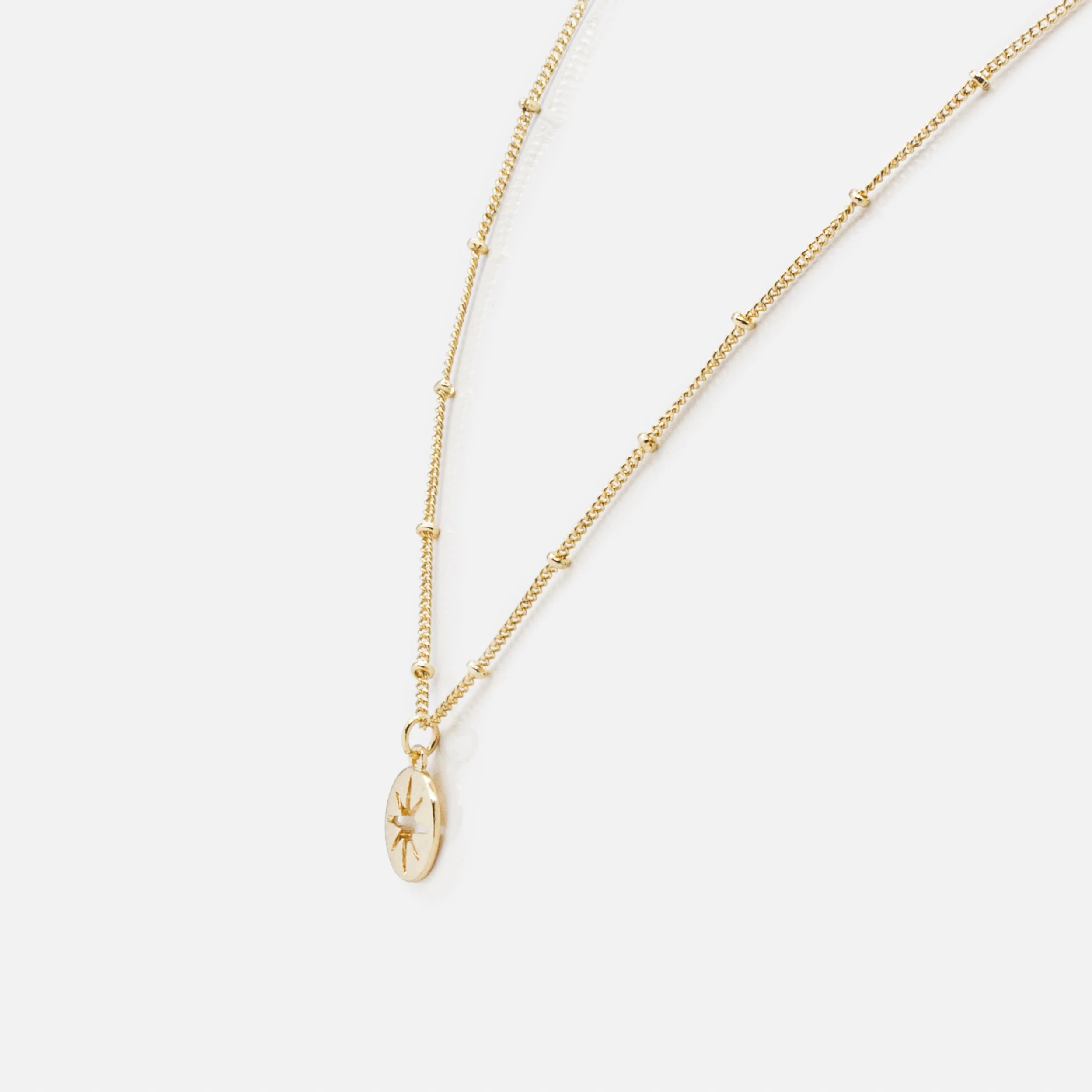 Collier doré breloque étoile vide - Image 2