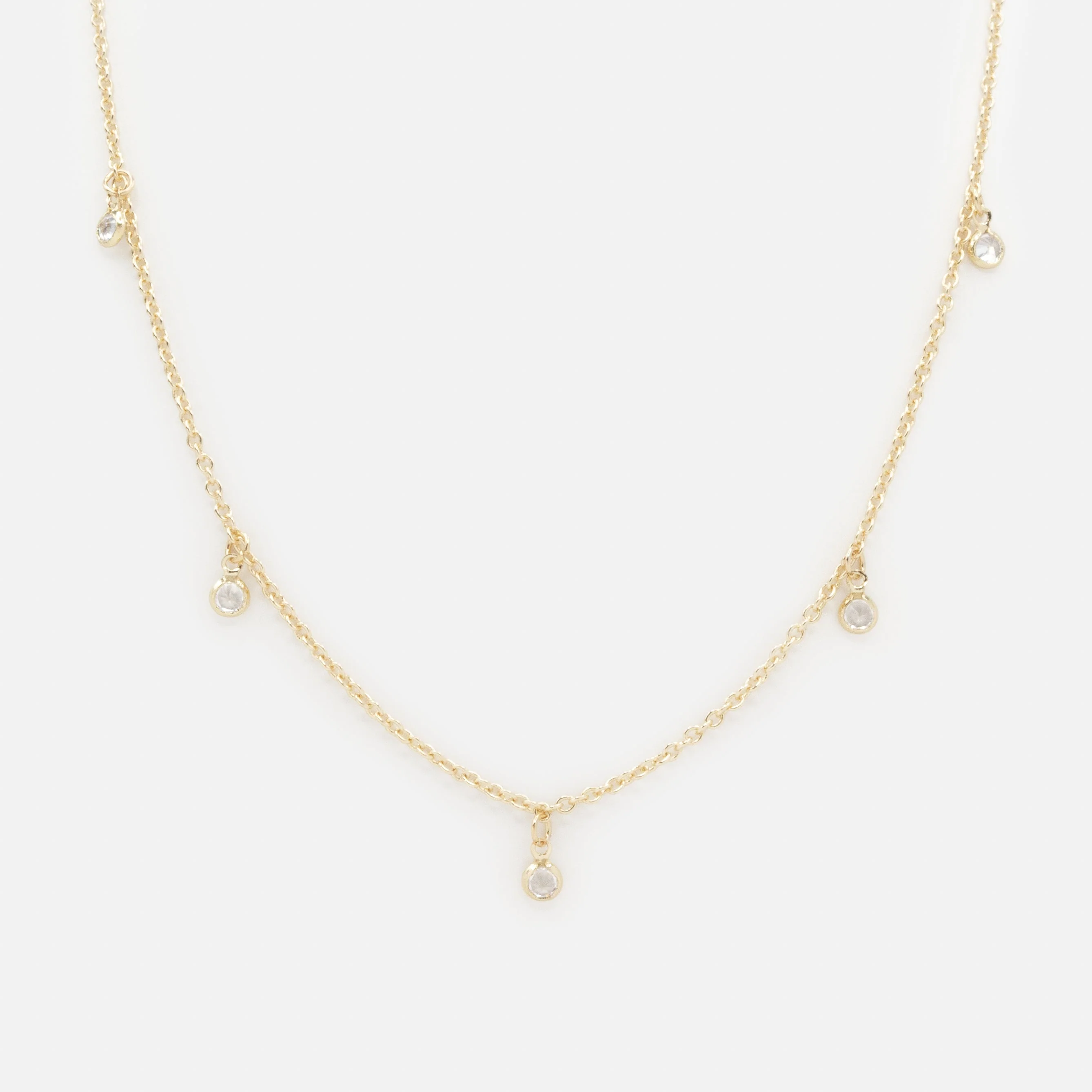 Collier doré petites breloques rondes avec zircons cubiques