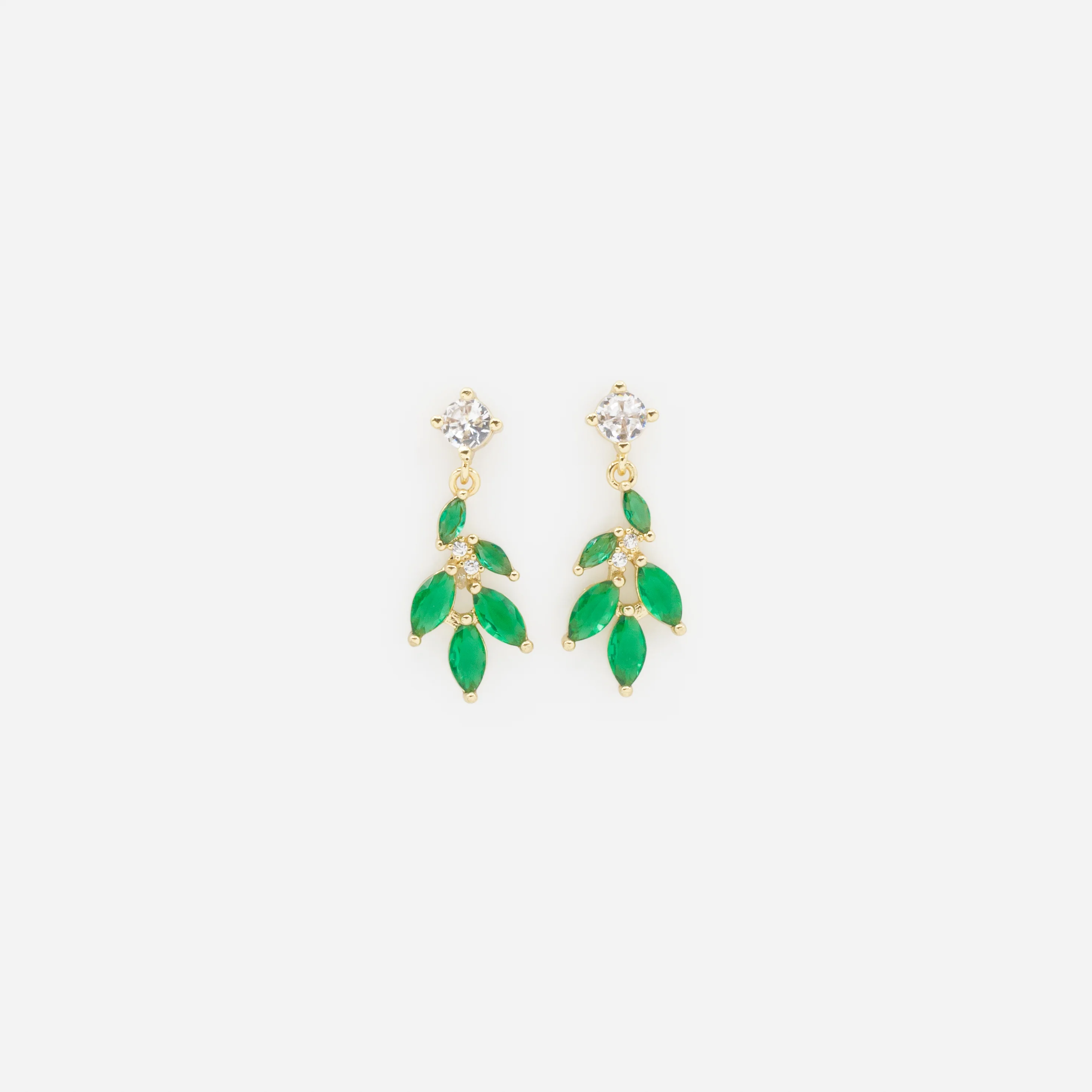 Boucles d'oreilles dorées avec feuilles émeraude