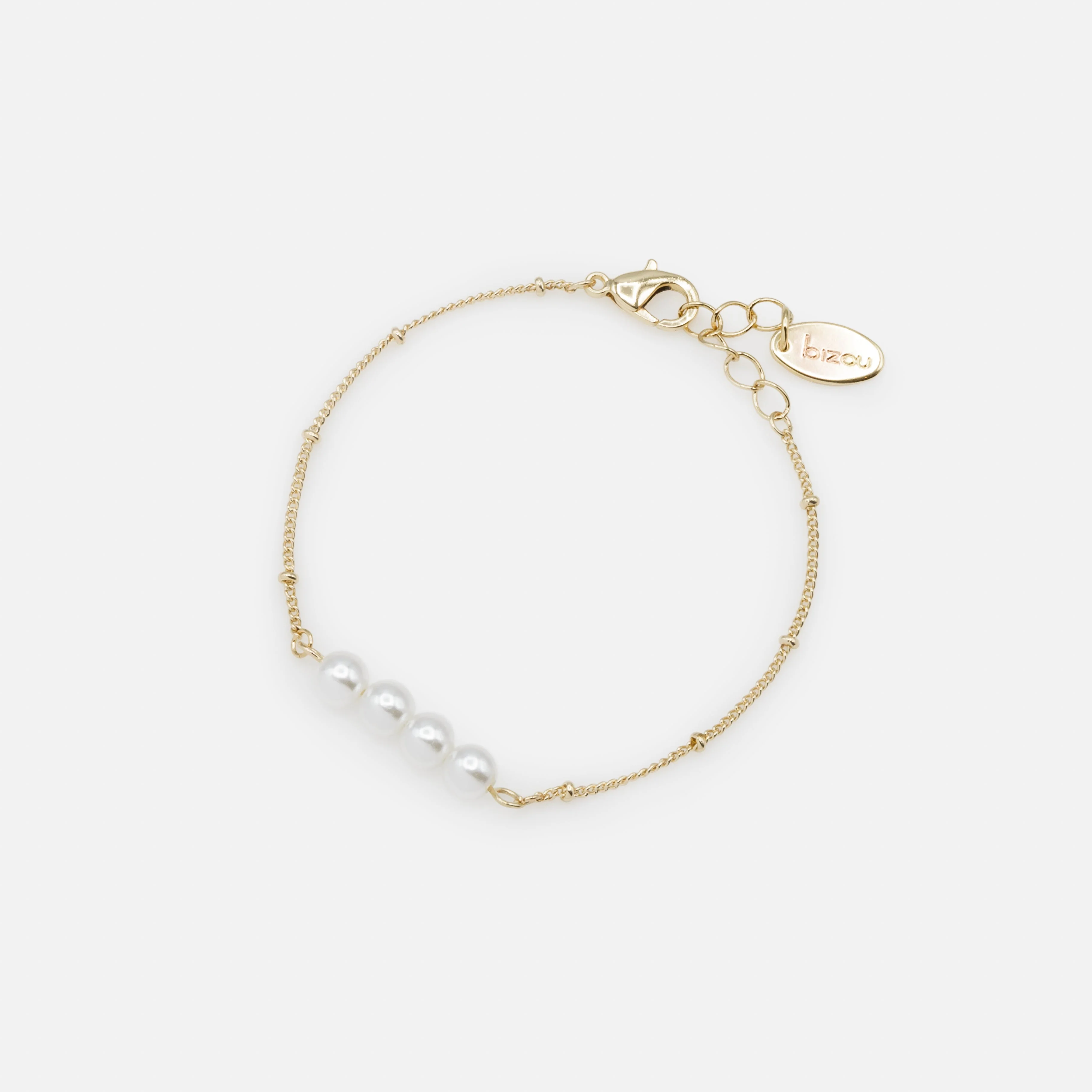 Bracelet doré quatuor de perles synthétiques