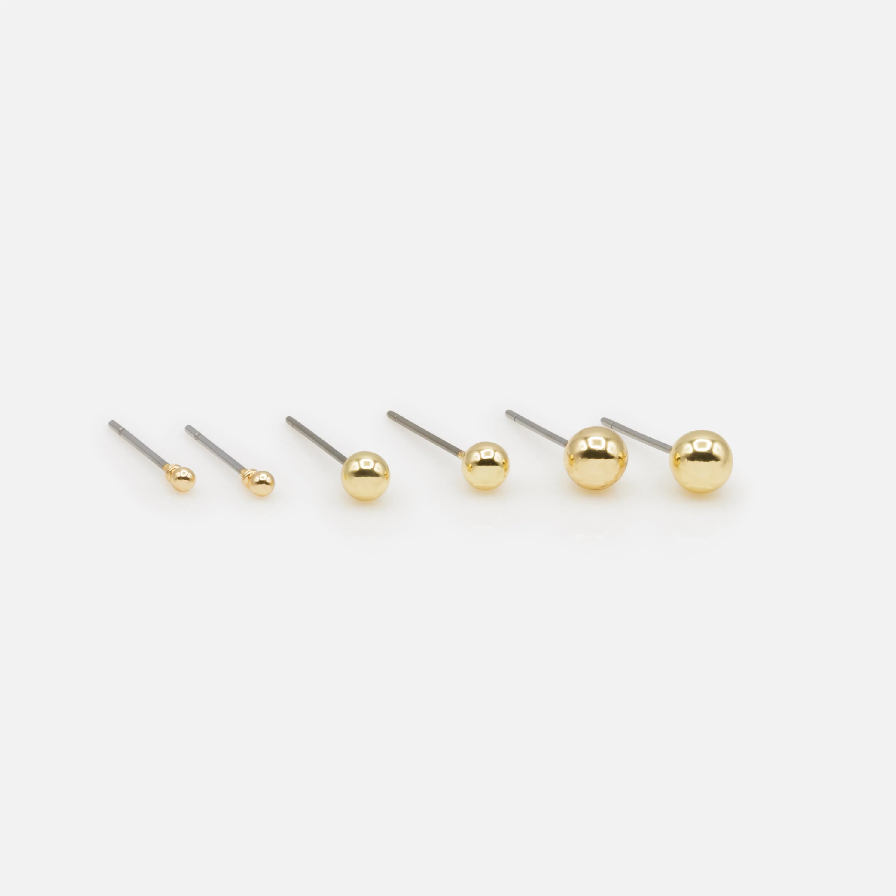 Trio de boucles d'oreilles dorées billes trois formats - Image 2
