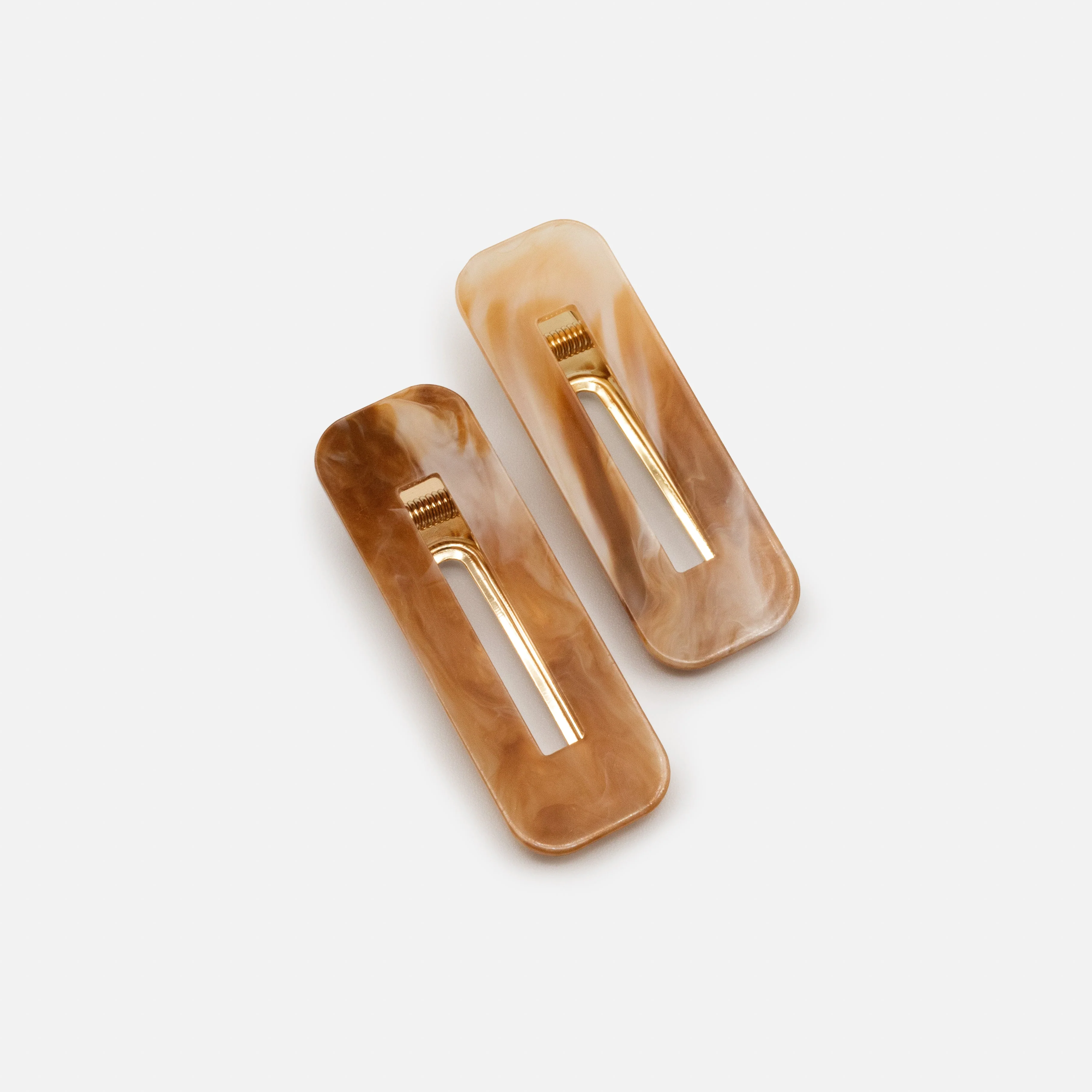 Duo de pinces marbrées ivoire & caramel en plastique