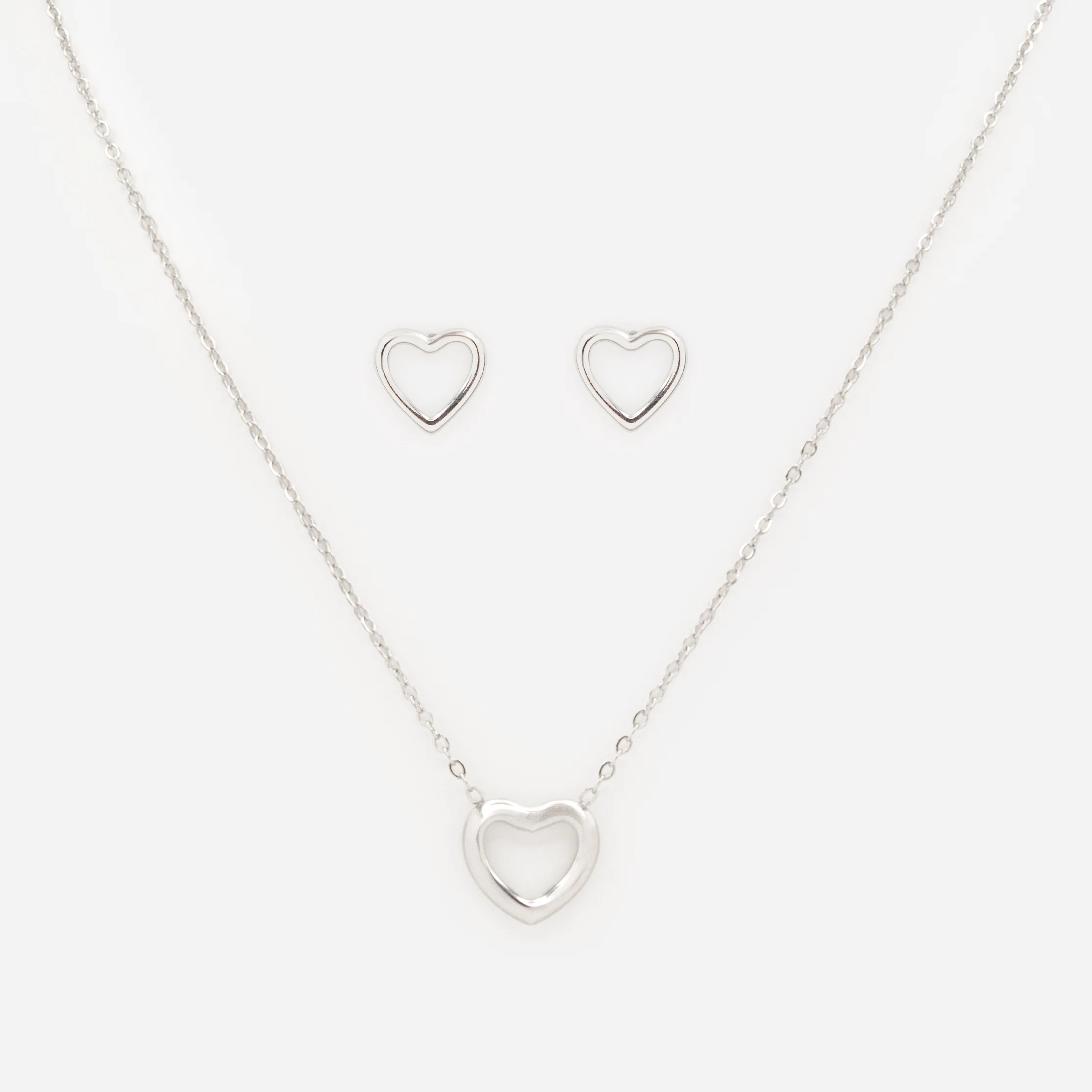 Ensemble collier et boucles d'oreilles argentés coeurs délicats en acier inoxydable