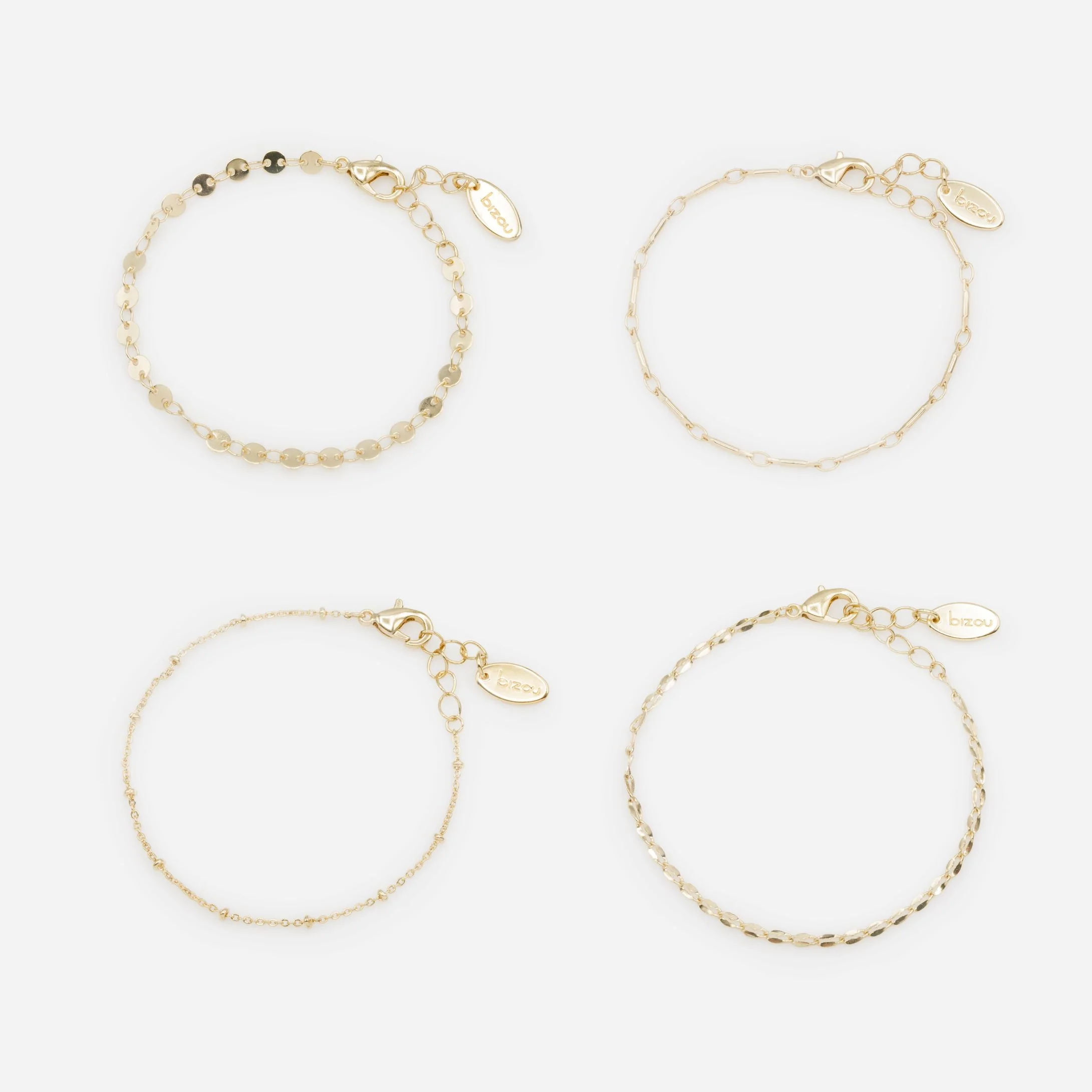 Ensemble de quatre bracelets dorés avec mailles originales