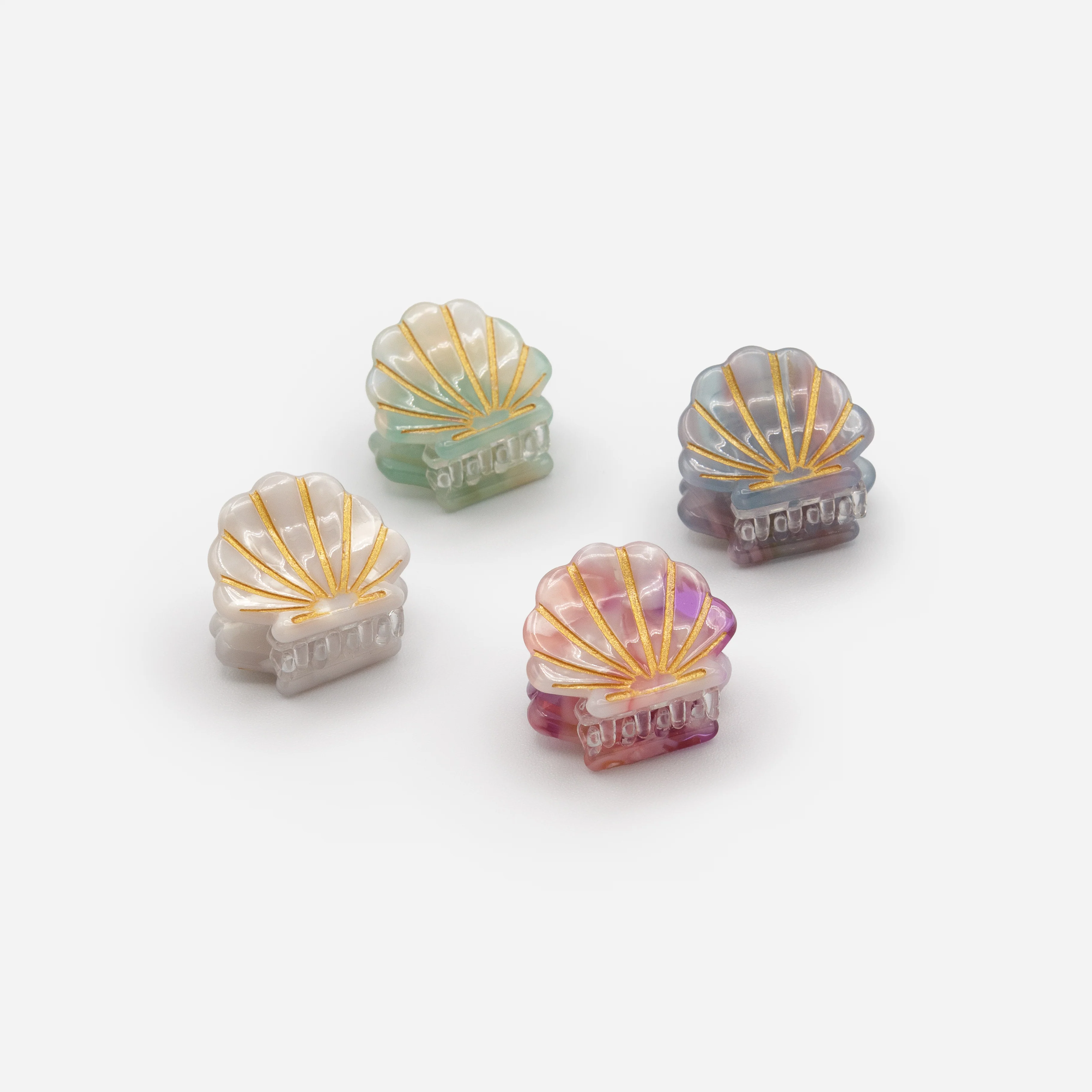 Ensemble de quatre petites pinces en coquillages multicolores - Image 2