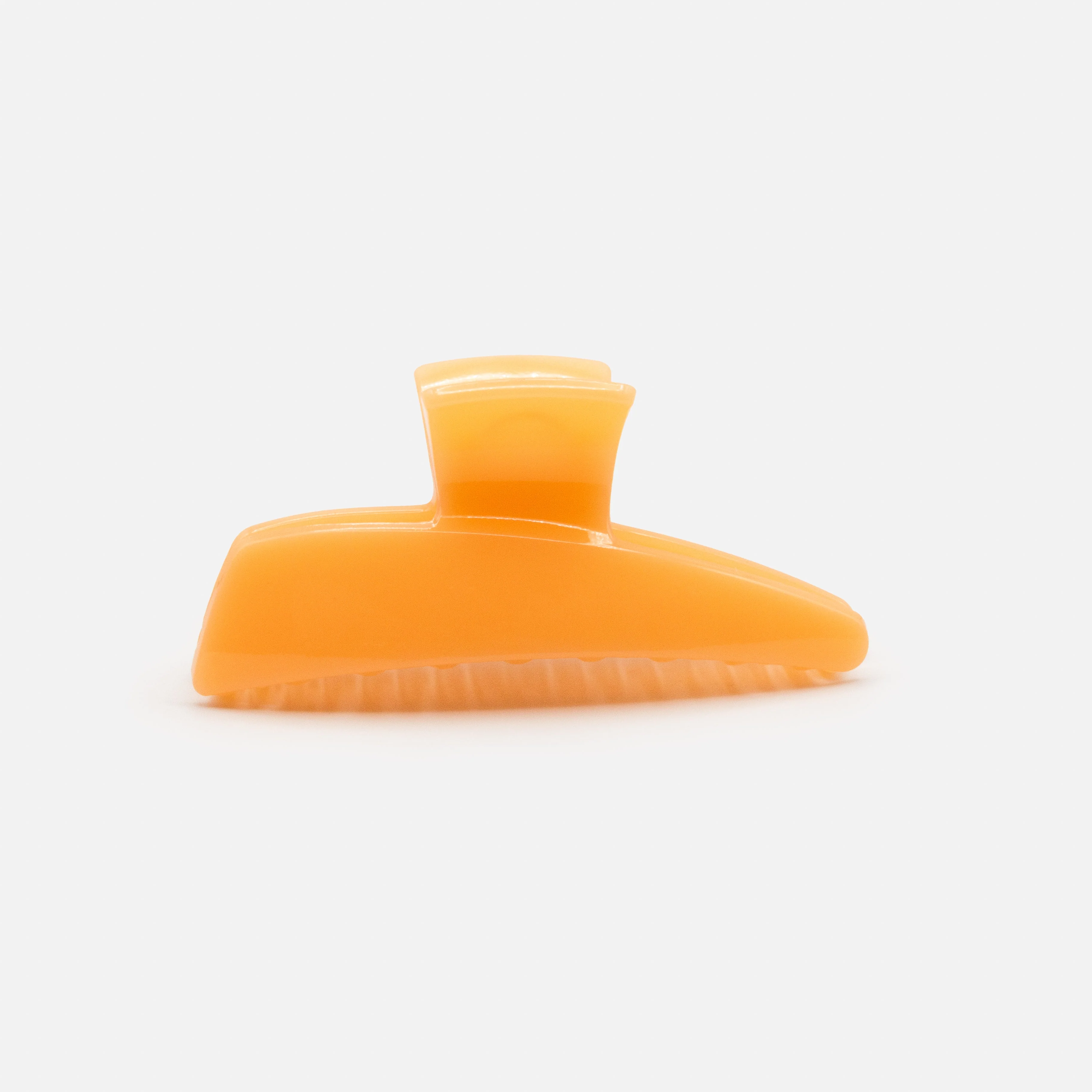 Pince géométrique pêche en plastique au fini lustré